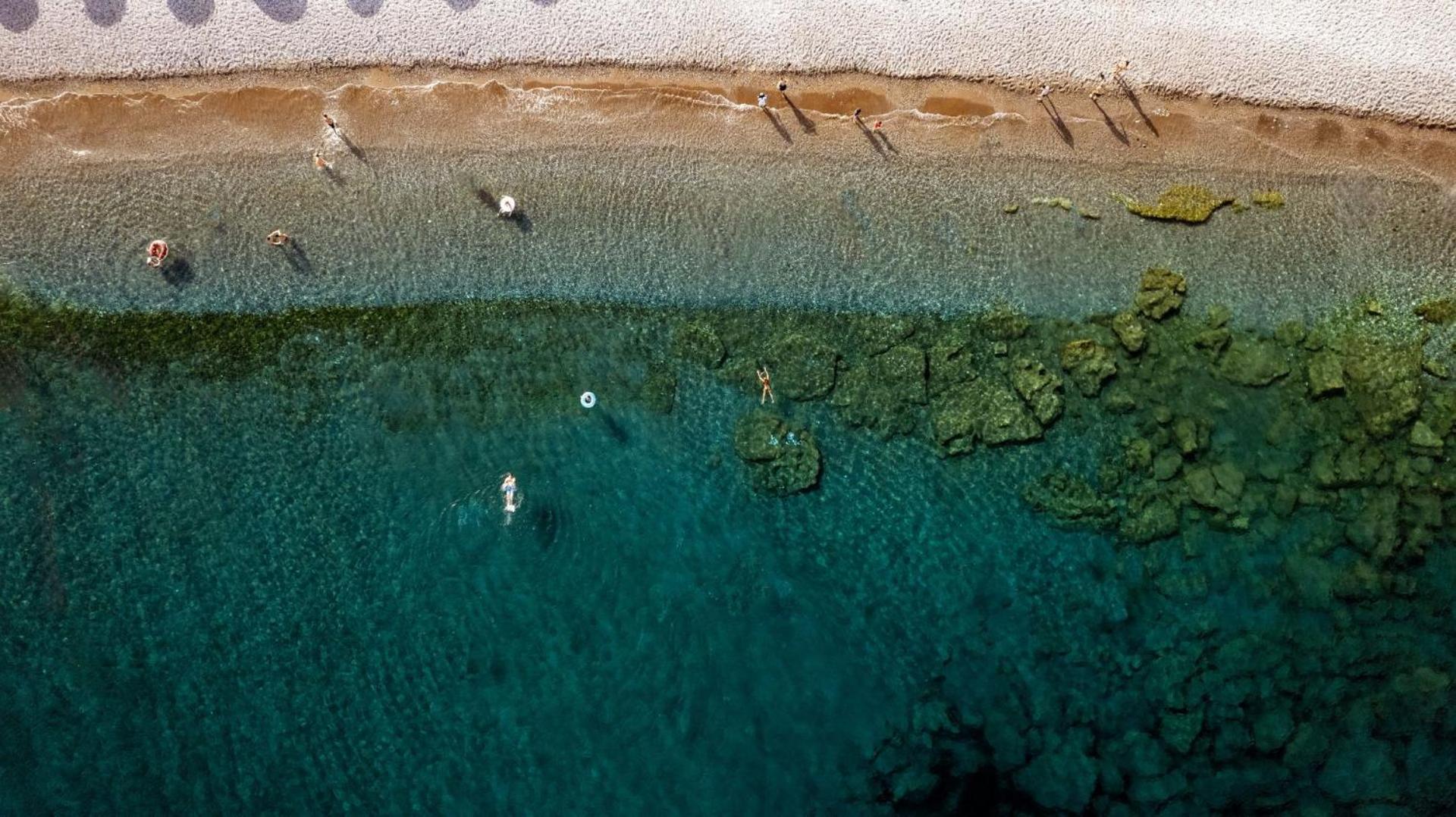 Mitsis Selection Alila Hotel Faliraki Bagian luar foto The blue hole at Blue Grotto